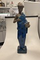 Danam Antik presents: Royal Copenhagen Johannes Hedegaard Large Figurine of Girl with Vase No. 21588