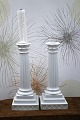 K&Co. presents: A pair of antique column candlesticks from Royal Copenhagen in white porcelain from the years ...