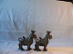 Graasten Antik & Kunst presents: A pair of Chinese Bronze Candlesticks ca. 1880 H. 13 Cm. In form of Fo-dogs.