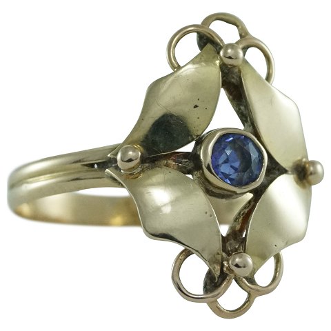 Ring of 14k gold set with a sapphire