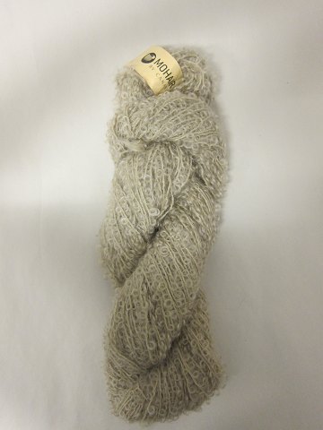Mohair Bouclé
Mohair Bouclé is a natural product of a very high quality from the angora goat 
from South Africa.
The colour shown is: Sand, Colourno 1005
1 ball of wool containing 100 grams