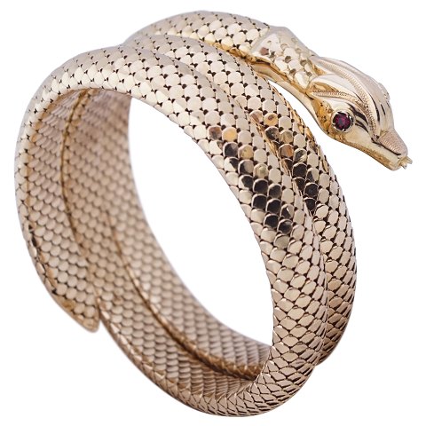 A bracelet of 18k gold and rubies, a snake