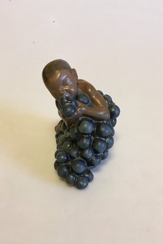 Bing & Grøndahl Figurine by Kai Nielsen "Little Bacchus with Grapes" No 4021 
from  The Grape Harvest Series