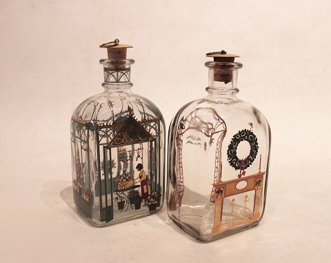A pair of christmas decanters, beautifully decorated , designed by Jette Frölich 
for Holmegaard in 1981.
5000m2 showroom.