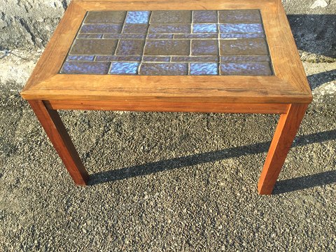 Rosewood table
with tiles.
400 kr