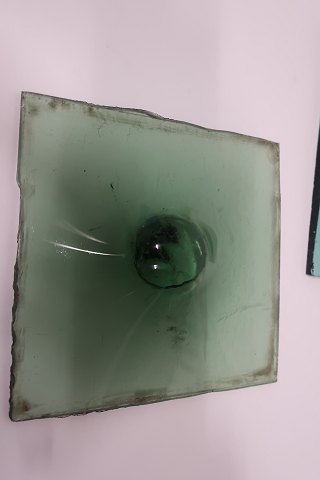 "Bottle bottom glass" i.e. a thick glass originally made as a windows glass
About 14cm x 14cm
About the end of the 1700