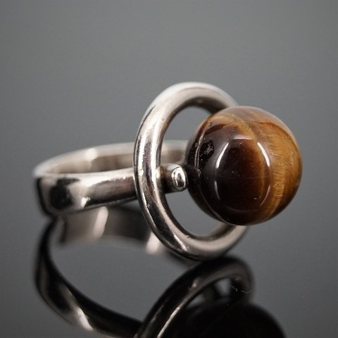 Hans Hansen; A ring made of sterling silver set with a tiger-eye