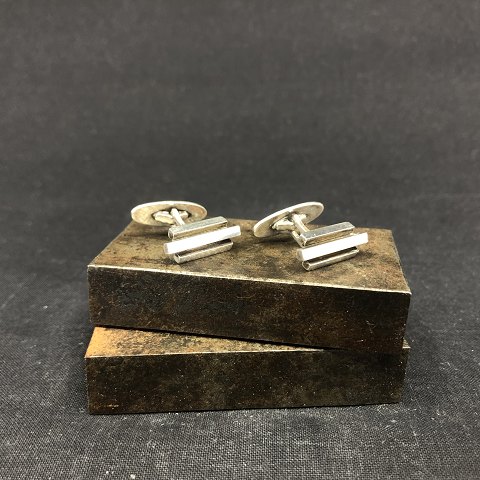 A pair of N. E. From cufflinks
