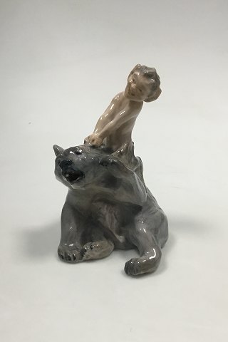 Royal Copenhagen Figure of faun pulling a bear in the ear No 1804. Designed by 
Knud Kyhn. From 1945