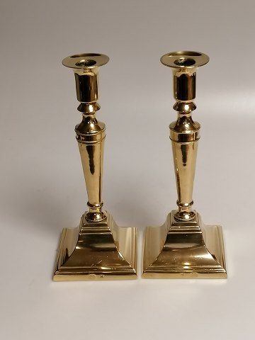 A pair of brass table tops stamped Kobbermøllen