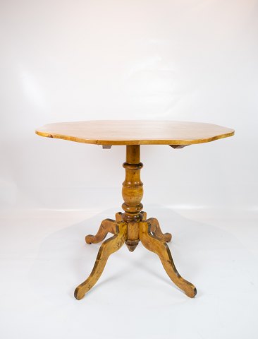 Antique side table of hand polished birch wood from the 1820s.
5000m2 showroom.