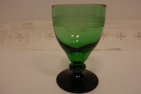 Glass, white wine, "Hørsholm" from Holmegaard
Green glass with black
These glasses are made by hand and they were also produced in a part of the 
1960-years 
H: about 10cm
We have 6 items in stock
In a good condition
We have a large choice of antique