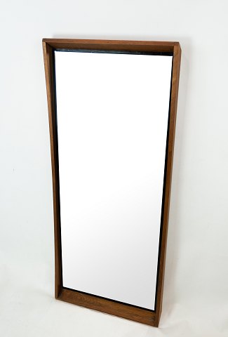 Mirror in teak of danish design from the 1960s.
5000m2 showroom.
