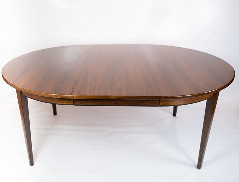 Dining table in rosewood, model 55, designed by Omann Junior from the 1960s.
5000m2 showroom.