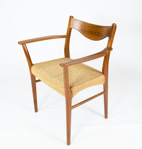 Armchair in teak and paper cord of Danish design from the 1960s. 
5000m2 showroom.