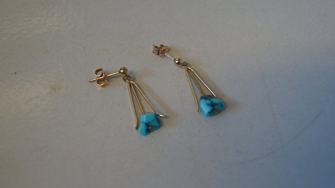 Elegant earrings with turquoise 8 carat gold