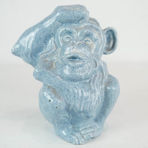 Ceramic figure in the shape of a monkey with light blue glaze from the 1960s. 
5000m2 showroom