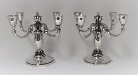 K. C. Hermann. A pair of 4-armed silver candlesticks. Height 21 cm. Good 
quality. Produced 1943.