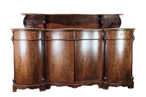 A late empire sideboard in mahogany with a curved front from the 1840s.
Dimensions in cm: H: 127 W: 190 D: 65
Great condition
