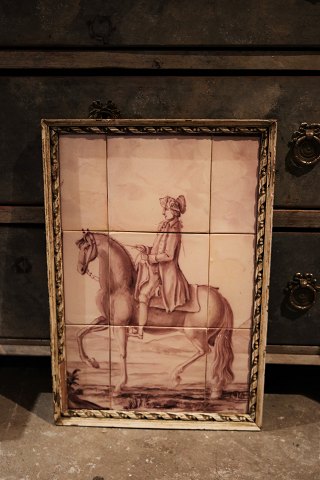 Old picture of Men on horseback, hand painted on tiles and framed in old frame 
with patina. 45.5x31cm.