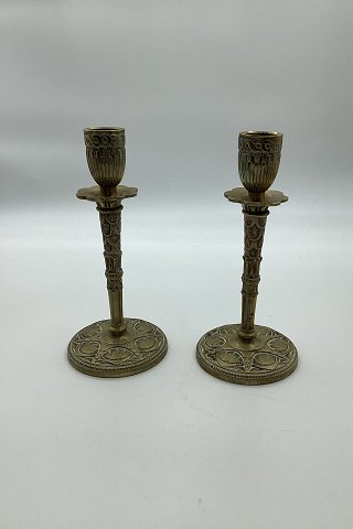 Pair of candle sticks in brass with art deco decorations c. 1920