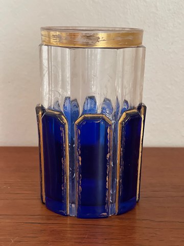 Antique vase of panel-cut crystal in cobalt blue and clear glass with gildings 
and faint floral pattern, in the style of Moser, 19.-20. century