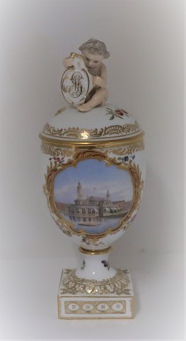 Royal Copenhagen. Porcelain egg vase with putti. Motif: The lake pavilion. 
Height 27 cm. Produced 1894-1900. (1 quality)