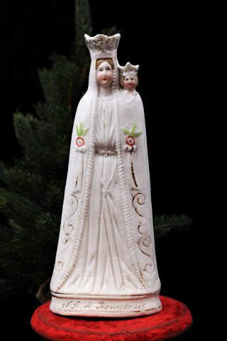 Decorative, old porcelain Madonna figure of the Virgin Mary with the baby 
Jesus...