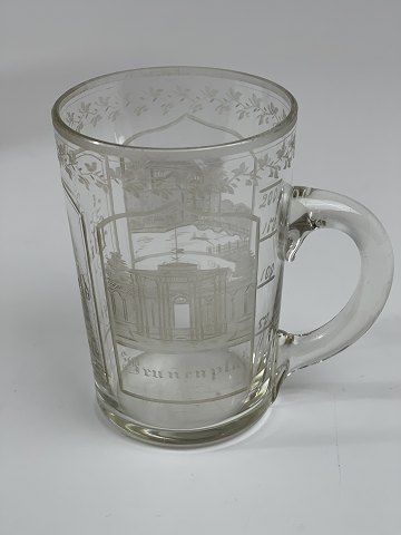 Glass and deciliter measure with engraving of the castle of Pyrmont in the town 
of Bad Pyrmont in Germany.