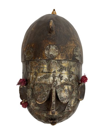 Small mask from Mali made of wood, metal and textile. The Marka people, 20th 
century.