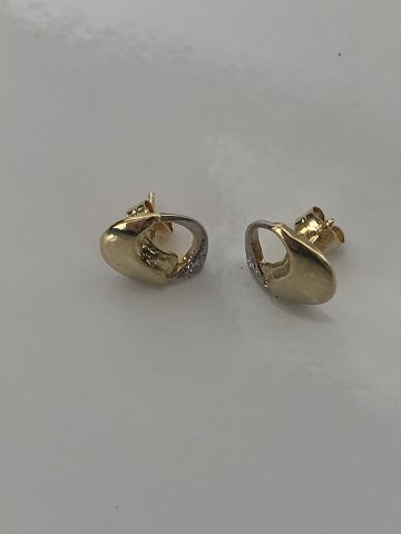Earrings in #14 carat gold with brilliant
Stamped 585
