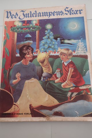 Ved Julelampens skær
Julehæfte for hjemmet
Fortællinger af forskellige forfattere
Illustreret af danske kunstnere
Redigeret og udvalgt af Grønvald-Fynbo
1965
Mange skønne og stemningsfyldte eventyr
Sideantal: 111