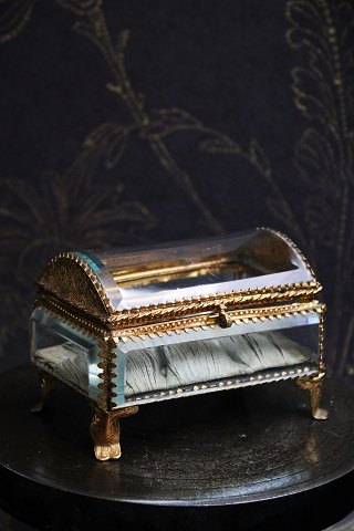 Antique French jewelery box in bronze and faceted glass 
with curved glass lid and silk cushion...