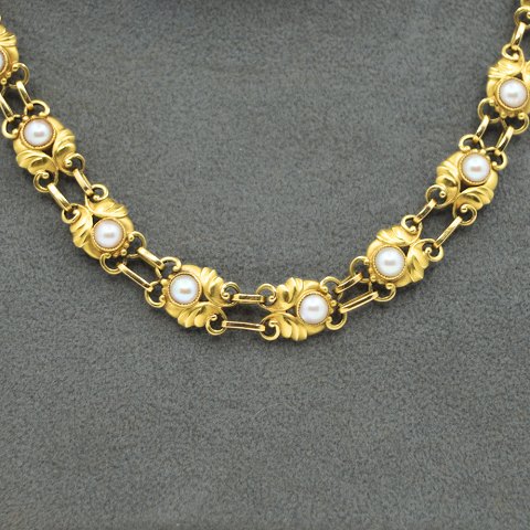 Georg Jensen; Necklace of 18k gold set with pearls, No 249