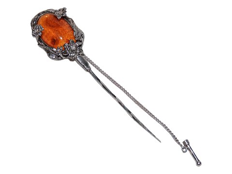 Amber hair needle with silver mounting