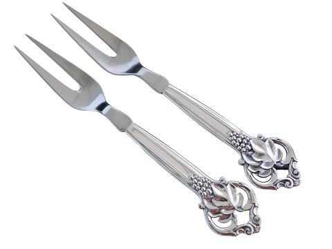 Ornamental silver
Meat fork 22.6 cm.
