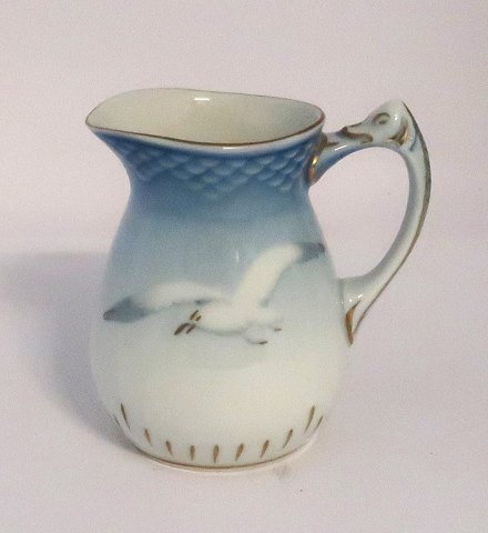 Bing & Grondahl. Seagull with gold. Creamer. Model 393. Height 9 cm. (2. 
quality)