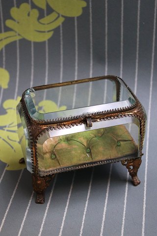 Antique French jewelry box in bronze with faceted glass and silk cushion at the 
bottom...