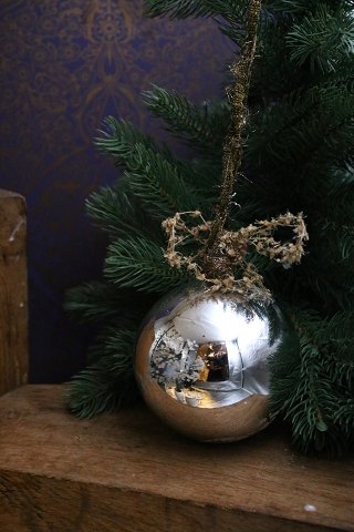 Swedish 19th century large Christmas bauble in Mercury Glass with remains of 
painted flowers. Dia.: 12cm.