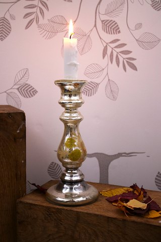 Antique French 19th century candlestick in Mercury silver glass with remnants of 
painted floral motif. H: 21cm.