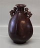 Royal Copenhagen Art Pottery
20877 RC Vase with two lion handles 23 cm x 16 cm ox blood glaze Bode Willumsen 
Febr. 1948