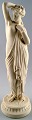 Antique large biscuit figure of semi-nude woman in classical style.
