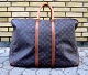 Louis Vuitton: An "Alize" travel bag of monogram canvas with two handles of 
leather.