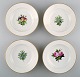 4 antique Royal Copenhagen deep plates in flora danica style.
