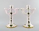 Signe Steffensen for Kähler: A pair of candelabra of ceramics, decorated with 
glaze in white and green shades.