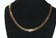 Antik Huset 
presents: 
Necklace 
brick 7 rows, 
14 carat gold