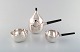 L'Art presents: Henning Koppel. Coffee service in sterling silver consisting of coffee pot, cream pot and sugar ...