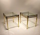A pair of sidetables of brass with plate of glass of italian design from the 
1960s.
5000m2 showroom.