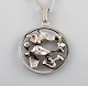 Ekenäs gold Nandor Kocsan, Hungarian-Swedish silversmith. Modernist silver 
necklace with organic pendant. 1972.
