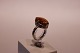Ring with brown and yellow stone, and of 830 silver.
5000m2 showroom.